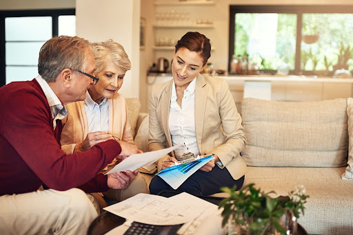 Professional consultant conversing with couple