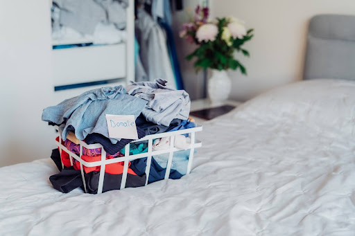 A basket of selected clothes for donating to Charity shop