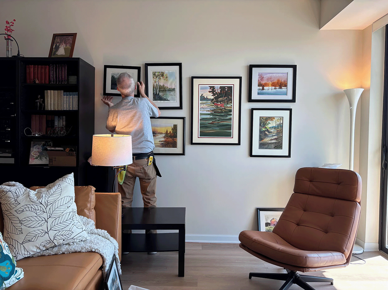 WR NOC moving in hanging photos