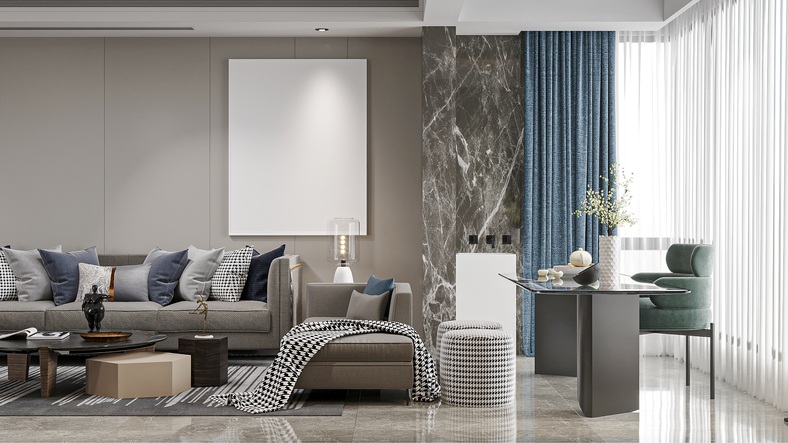 A gray themed room is staged with modern furniture