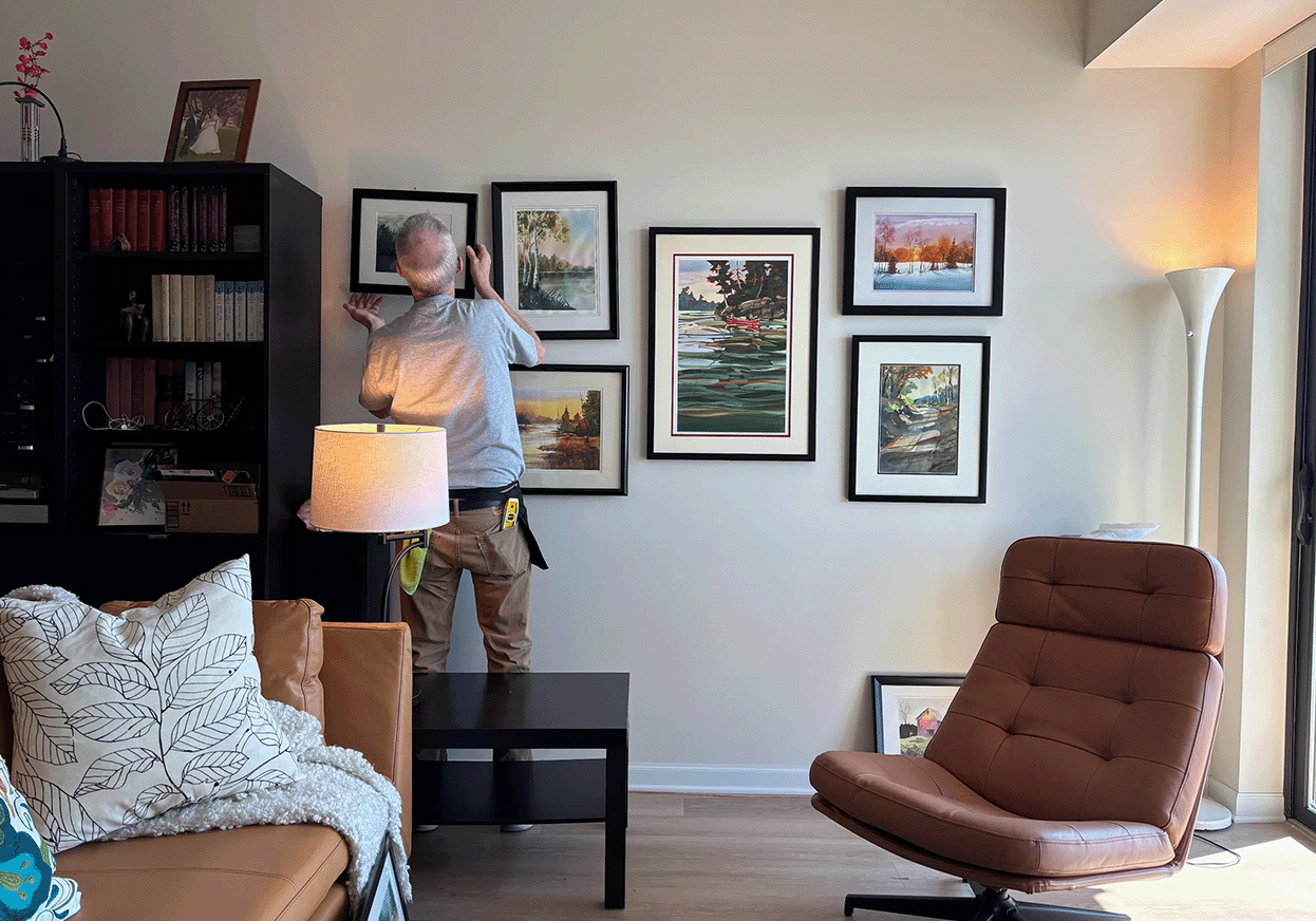 moving in hanging photos